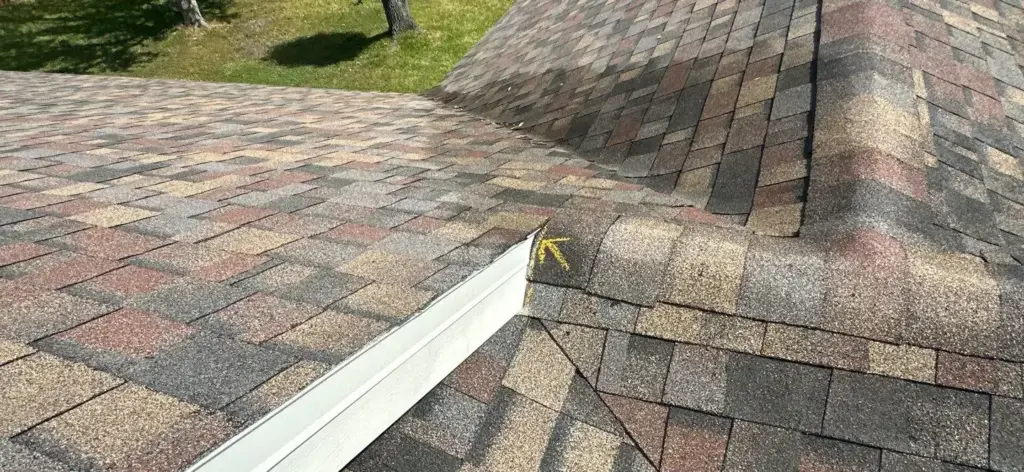 Roof repair in Hillsborough County, FL - rebuilt section of shingles
