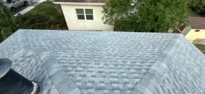 Crew installing new roofing system on a Clearwater home