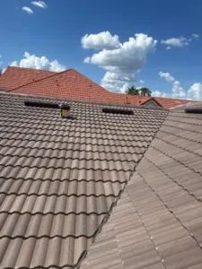 Ridge cap detail on a completed tile roof in Hillsborough County