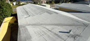 Crew removing old roofing during a St. Petersburg roof replacement