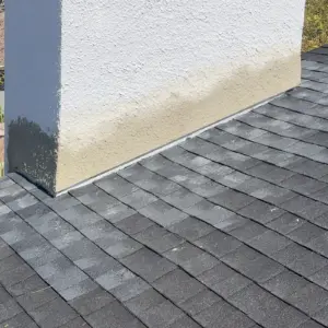 Completed roof replacement in Hillsborough County with new shingles and ridge line detail