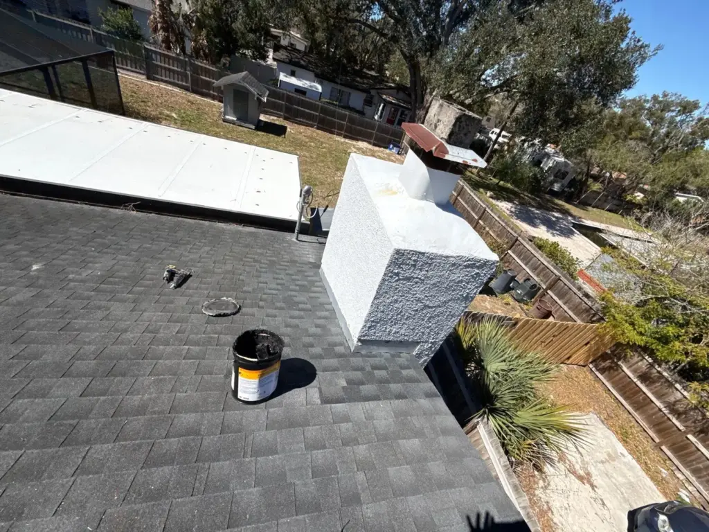 Roof replacement in progress on a Hillsborough County home showing new decking and underlayment